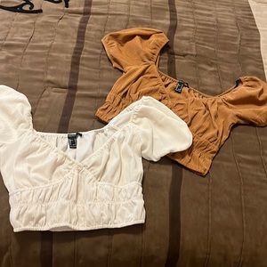 Size M crop tops one cream and the other brown
